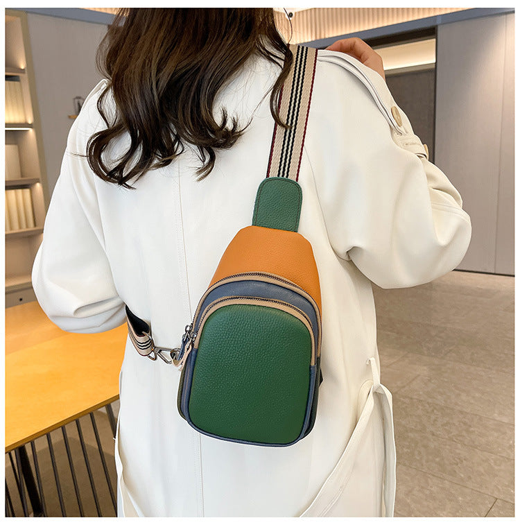 Front view showing the sling bag's color panels