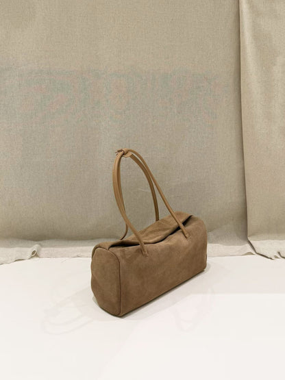 Caramel nubuck cowhide Boston shoulder tote in angled view