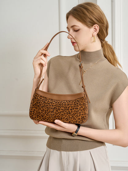 Small caramel suede-textured cowhide crossbody bag, front view