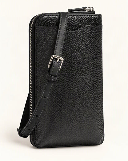 Cowhide Leather Vertical Phone Crossbody Bag — front three-quarter view on a warm white background