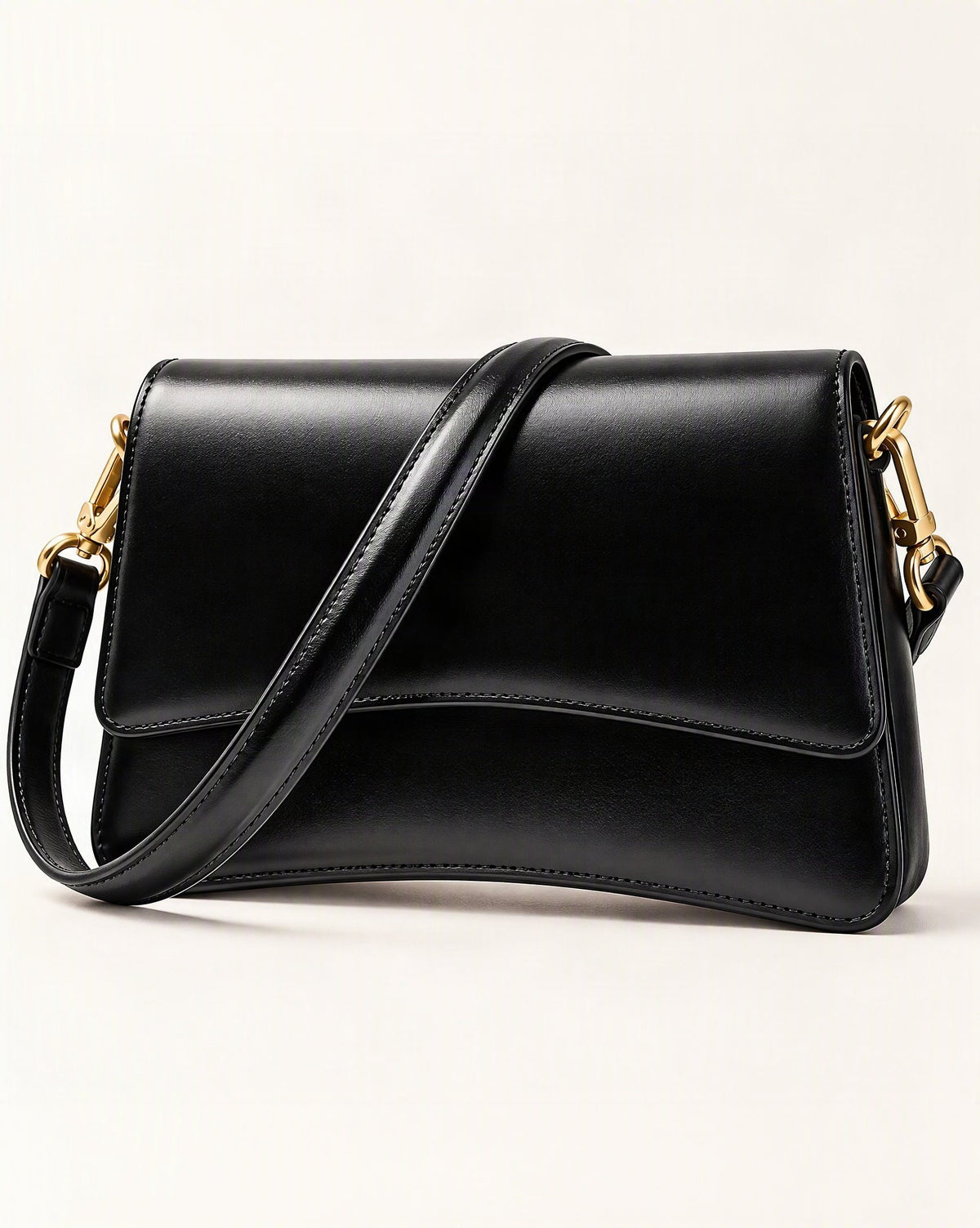Cowhide Leather Small Shoulder Bag with Flap Closure — front three-quarter view on a warm white background