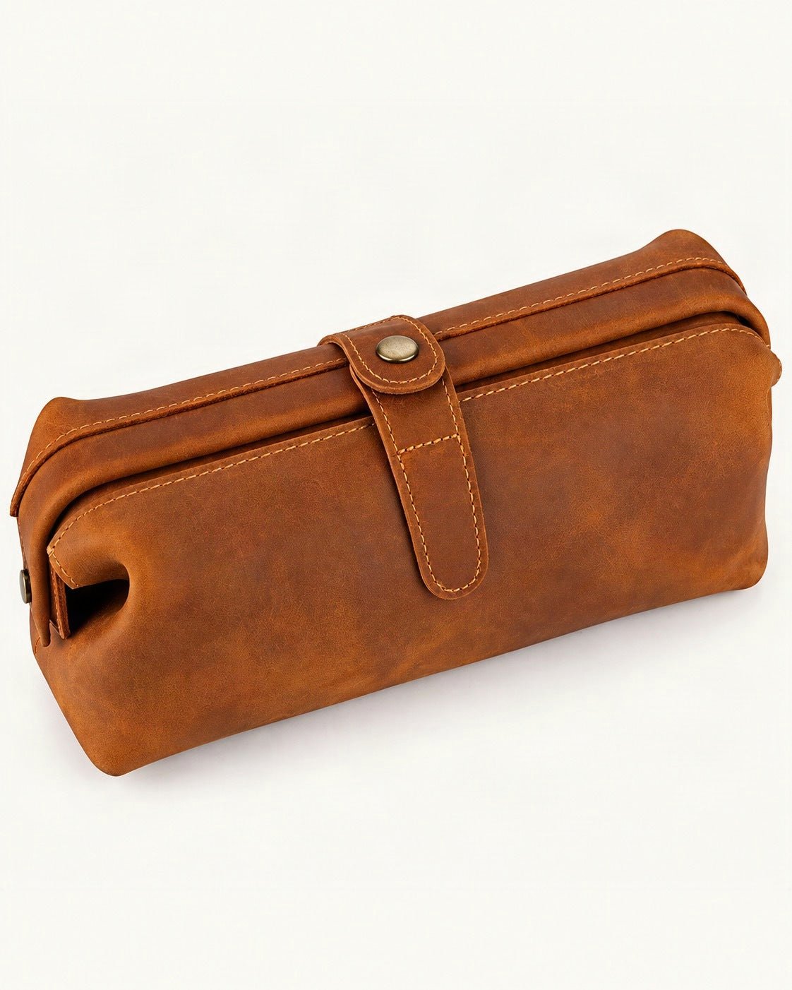 Top-Grain Cowhide Cosmetic Pouch — front three-quarter view on a warm white background