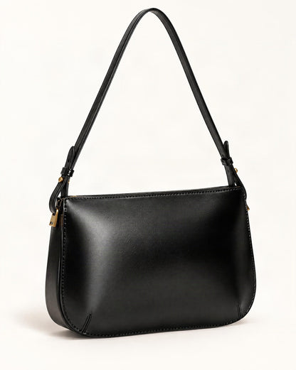 Cowhide Leather Underarm Bag with Detachable Strap — front three-quarter view on a warm white background