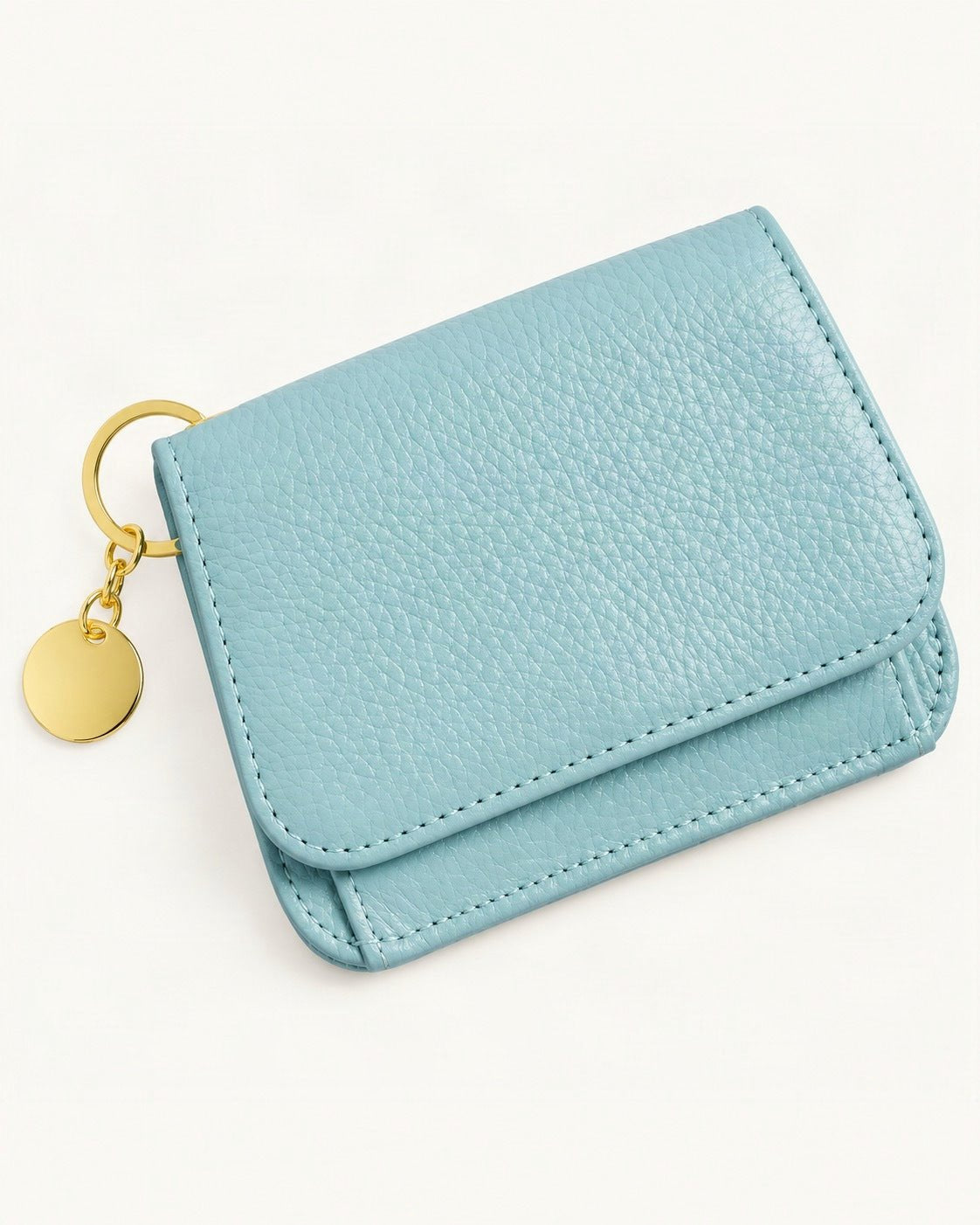 Genuine Leather RFID-Blocking Mini Wallet with Keyring Charm — front three-quarter view on a warm white background