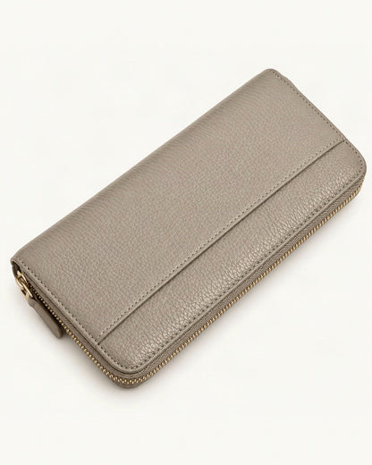 Top-Grain Cowhide Zip-Around Long Wallet with RFID Blocking — front three-quarter view on a warm white background