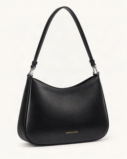 Cowhide Leather Underarm Shoulder Bag — front three-quarter view on a warm white background