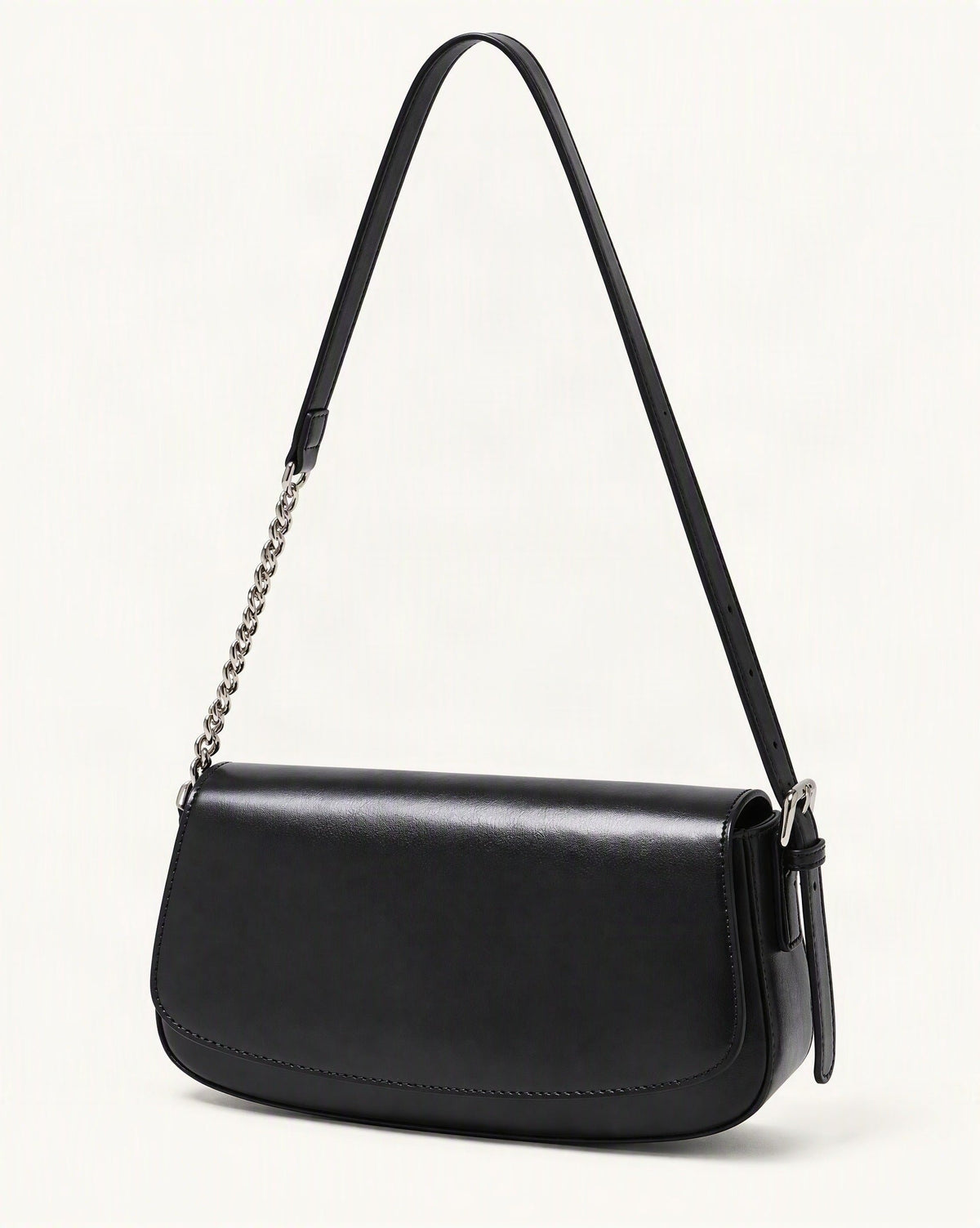 Cowhide Leather Baguette Saddle Shoulder Bag — front three-quarter view on a warm white background