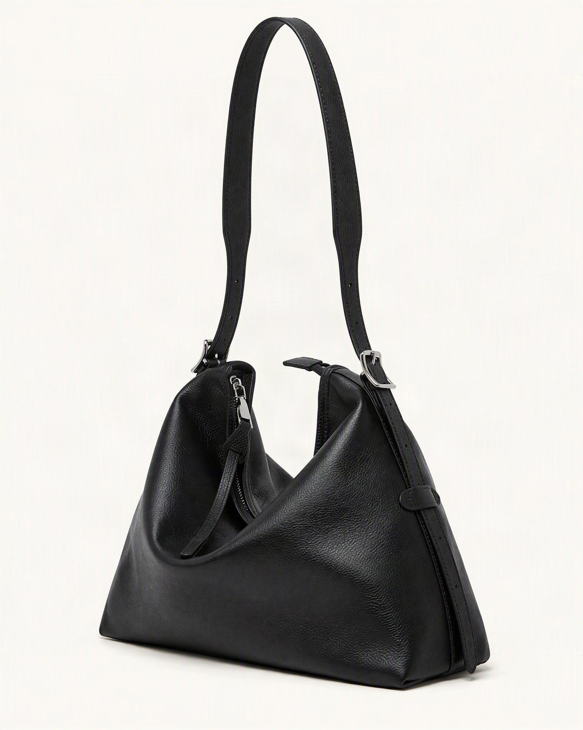 Leather Small Plus Shoulder Bag — front three-quarter view on a warm white background