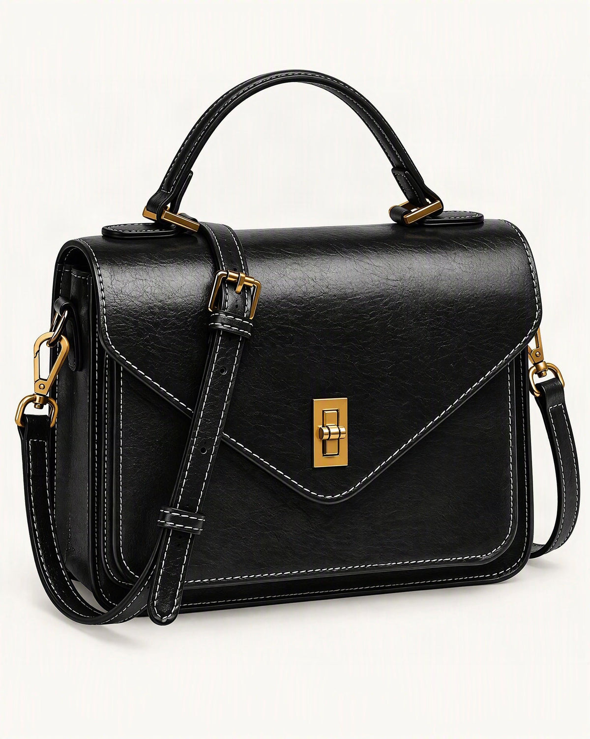 Cowhide Leather Small Messenger Crossbody Bag — front three-quarter view on a warm white background