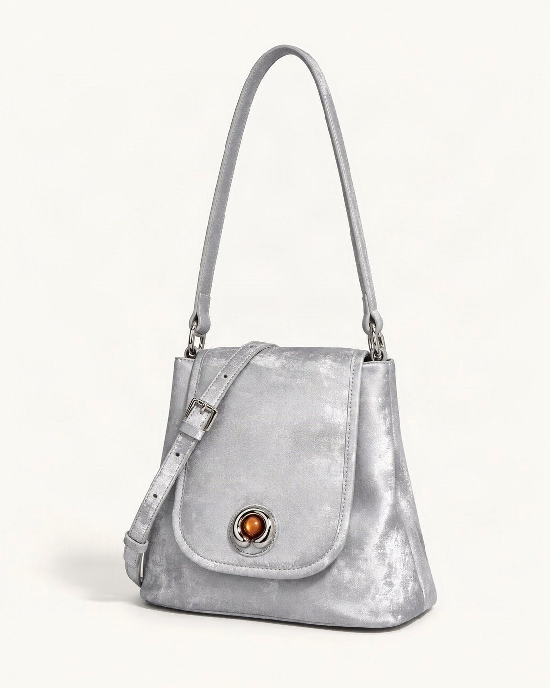 Split Leather Small Bucket Bag with Magnetic Flap — front three-quarter view on a warm white background