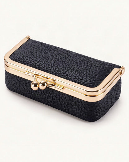 Top-Grain Cowhide Lipstick and Jewelry Pouch with Mirror — front three-quarter view on a warm white background