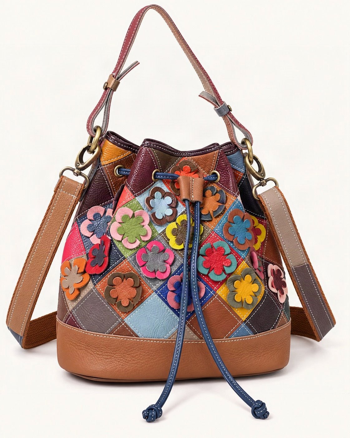 Top-Grain Cowhide Small Bucket Shoulder Bag — front three-quarter view on a warm white background