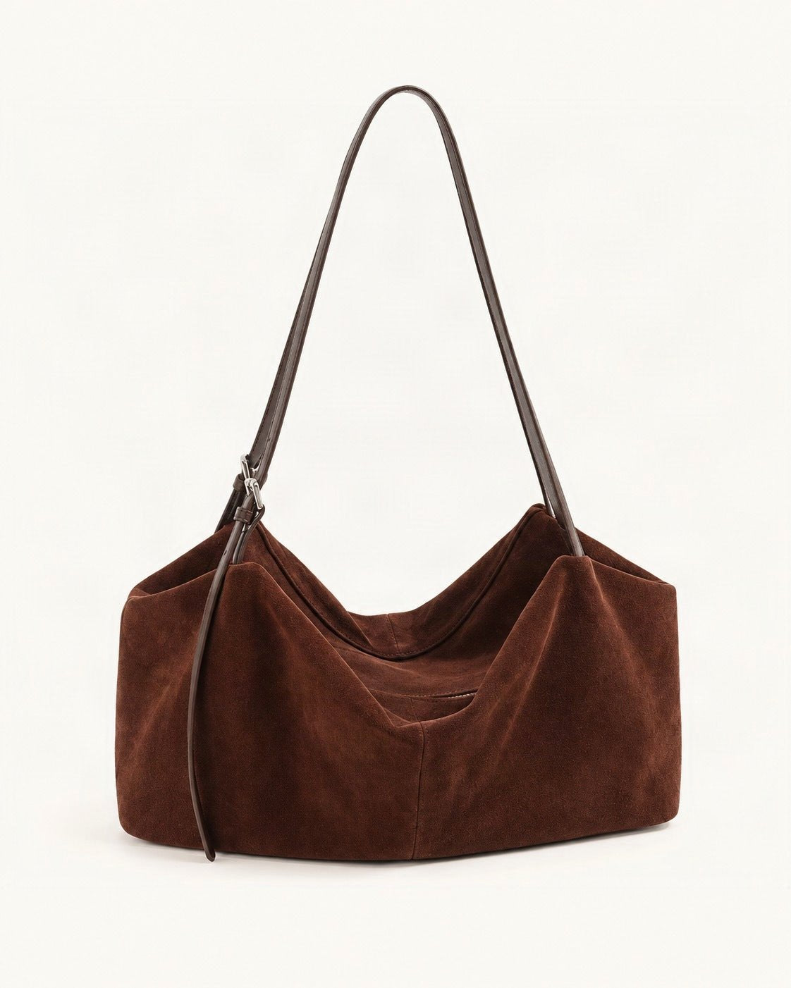 Suede Cowhide Zip Shoulder Tote Bag — front three-quarter view on a warm white background