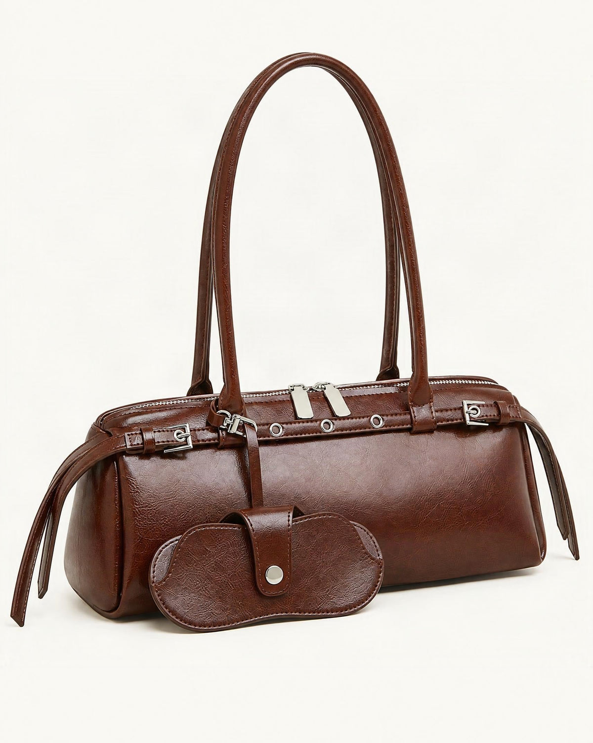 Cowhide Leather Small Barrel Tote with Sunglass Pouch — front three-quarter view on a warm white background