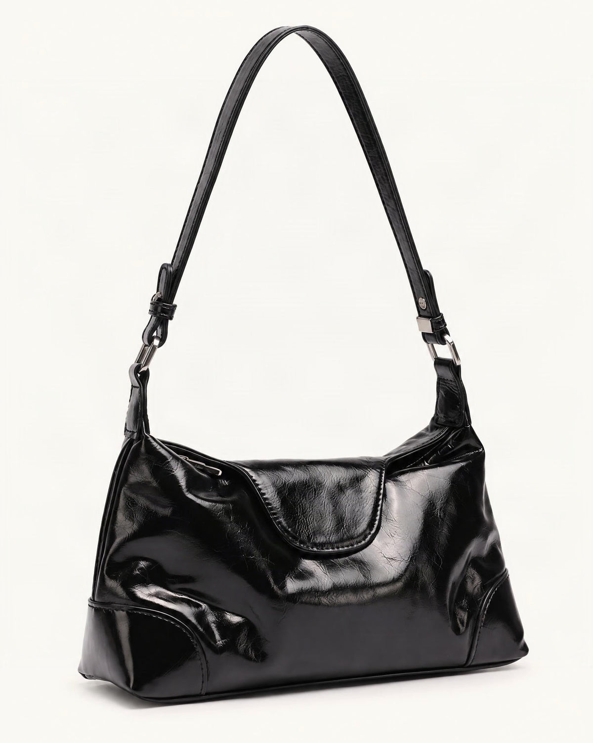 Cowhide Leather Small Shoulder Bag with Adjustable Strap — front three-quarter view on a warm white background