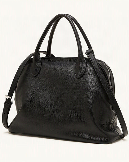Cowhide Leather Small Bowling Tote Bag, Pebbled — front three-quarter view on a warm white background