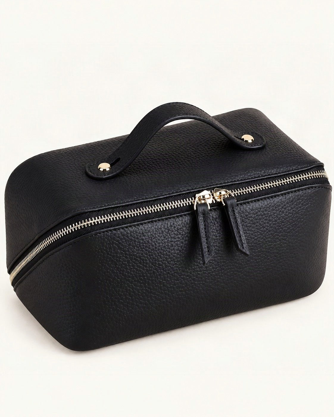 Top-Grain Cowhide Cosmetic Pouch with Double Zippers — front three-quarter view on a warm white background