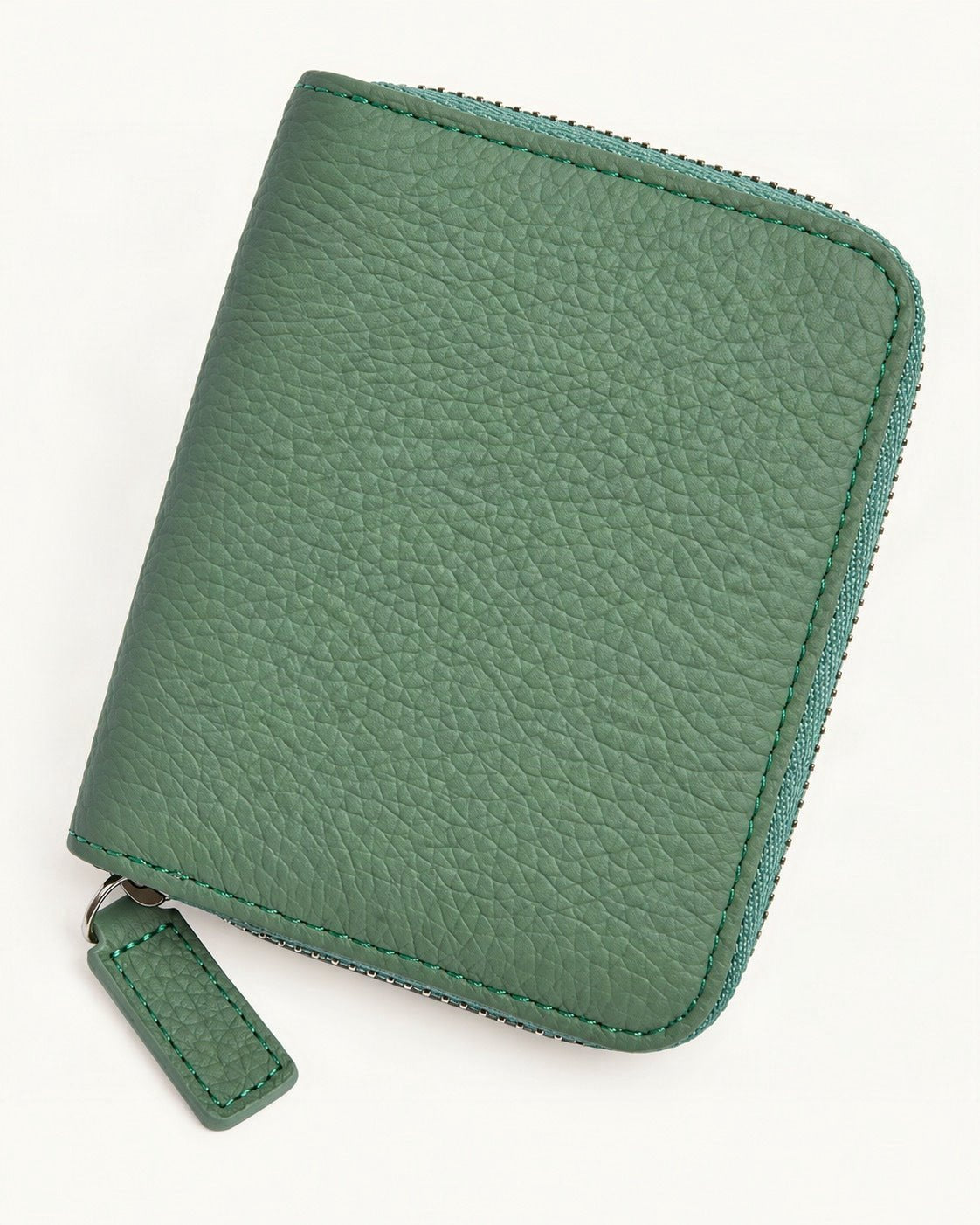 Top-Grain Cowhide Zip Wallet with RFID-Blocking Card Slots — front three-quarter view on a warm white background
