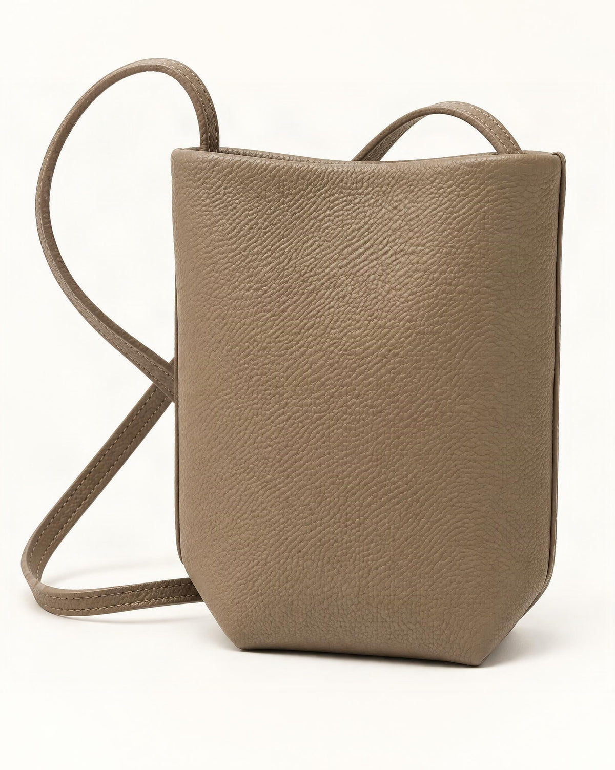 Top-Grain Cowhide Mini Bucket Crossbody Bag – Color Options — front three-quarter view on a warm white background