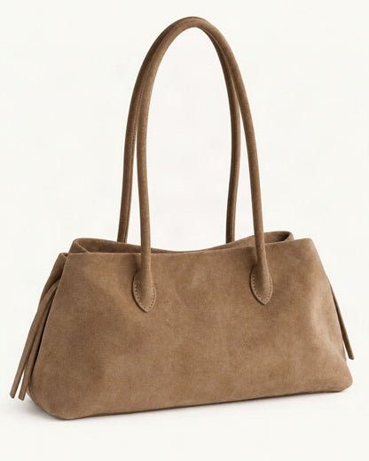 Top-Grain Nubuck Cowhide Shoulder Tote — front three-quarter view on a warm white background