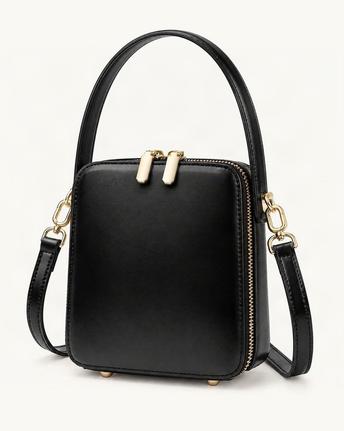 Cowhide Leather Micro Box Bag Top Handle Crossbody — front three-quarter view on a warm white background