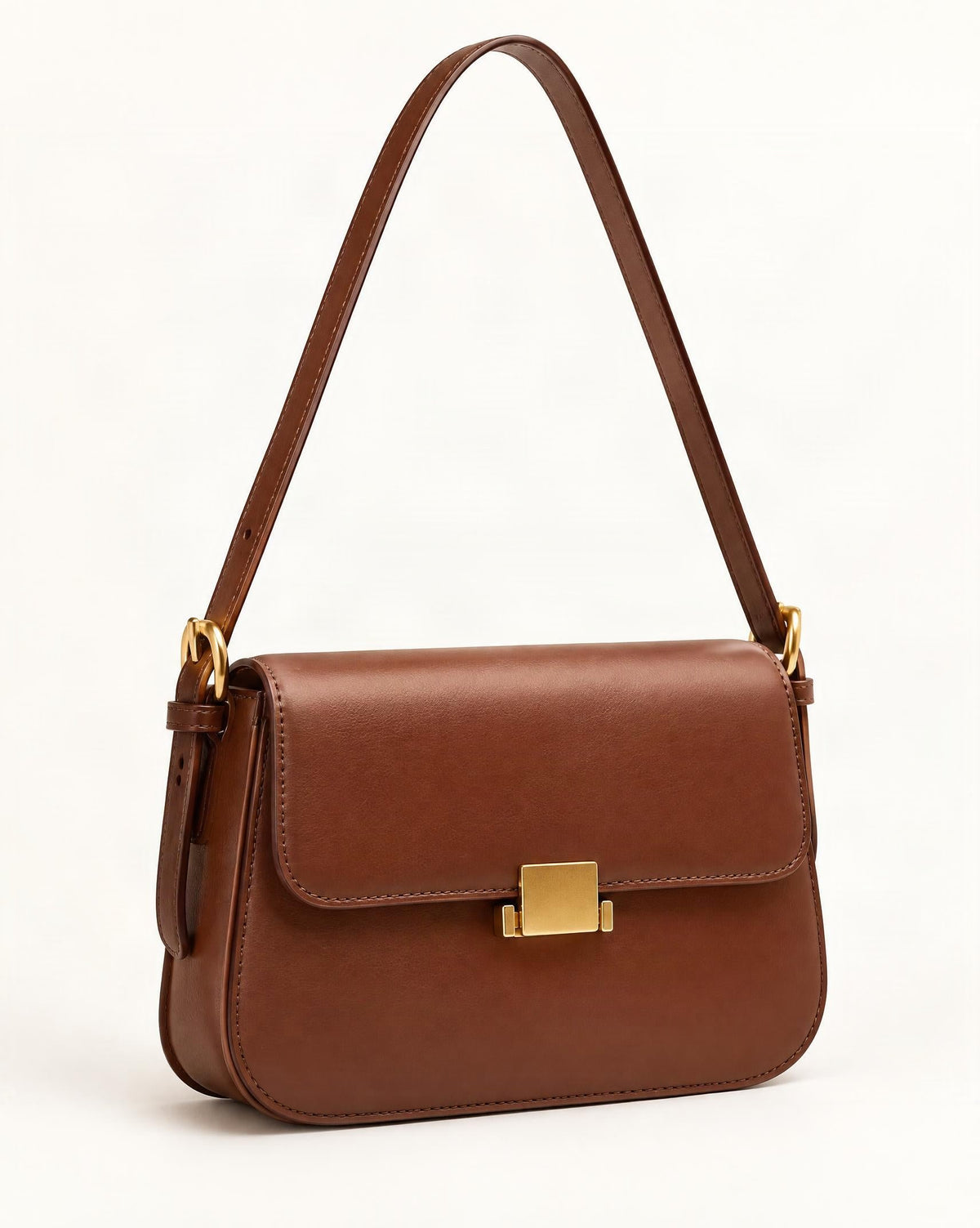 Cowhide Leather Small Shoulder Bag — front three-quarter view on a warm white background