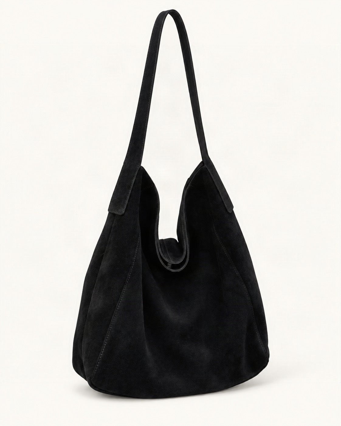 Suede Cowhide Shoulder Tote Bag — front three-quarter view on a warm white background