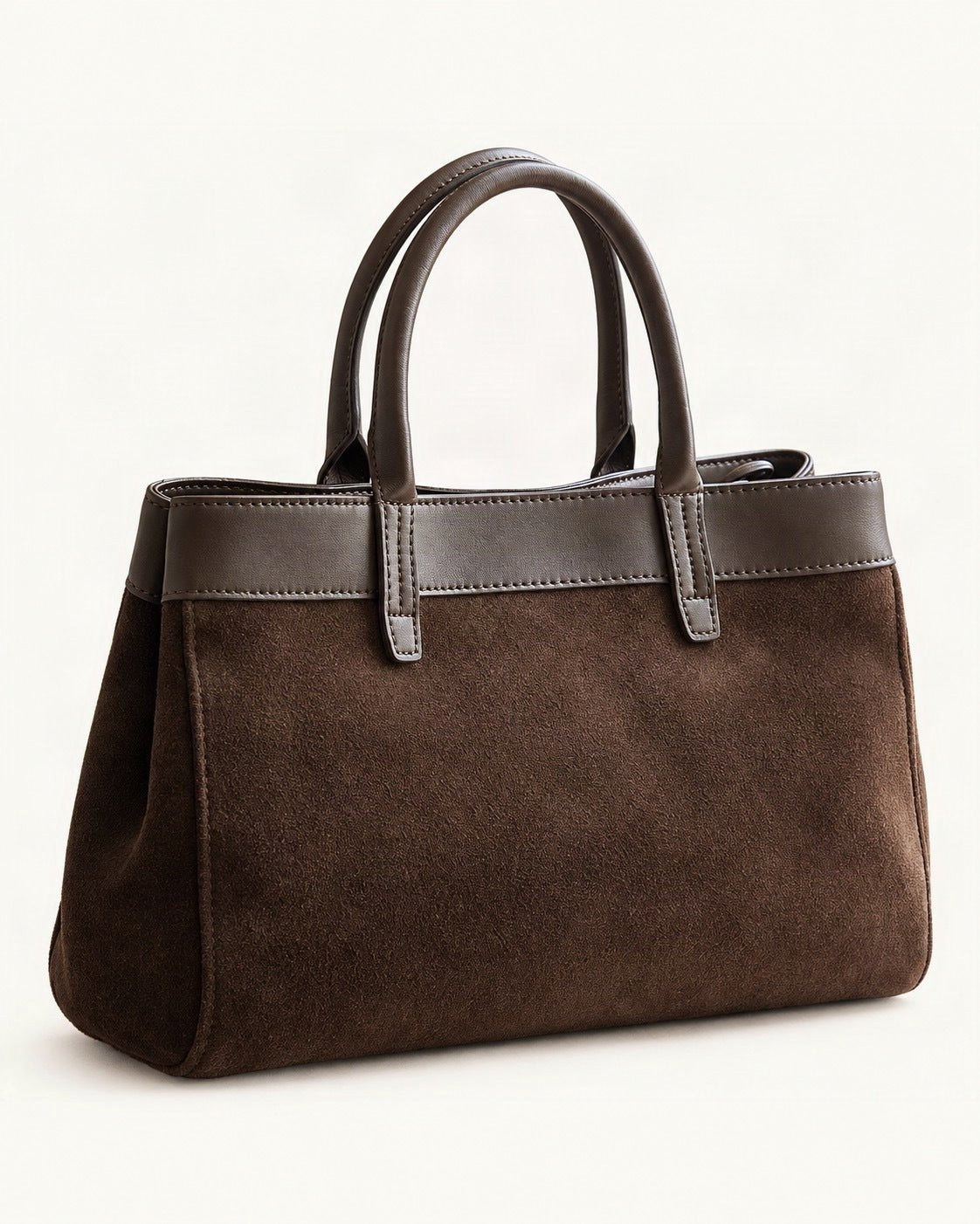 Suede Cowhide Top-Handle Shoulder Bag — front three-quarter view on a warm white background
