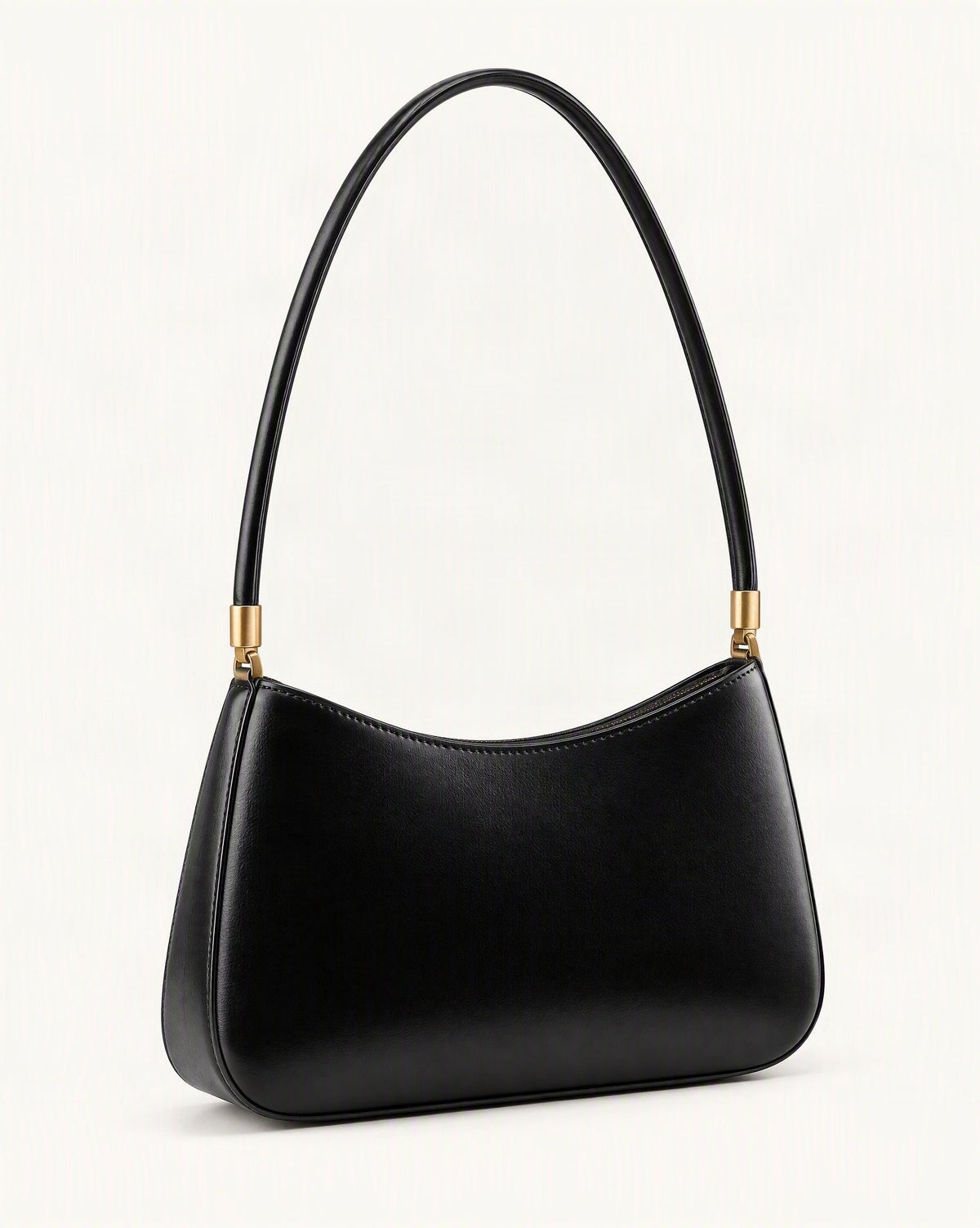 Cowhide Leather Shoulder Bag — front three-quarter view on a warm white background
