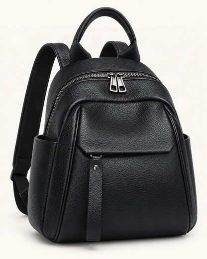 Top-Grain Cowhide Backpack with Multiple Pockets — front three-quarter view on a warm white background