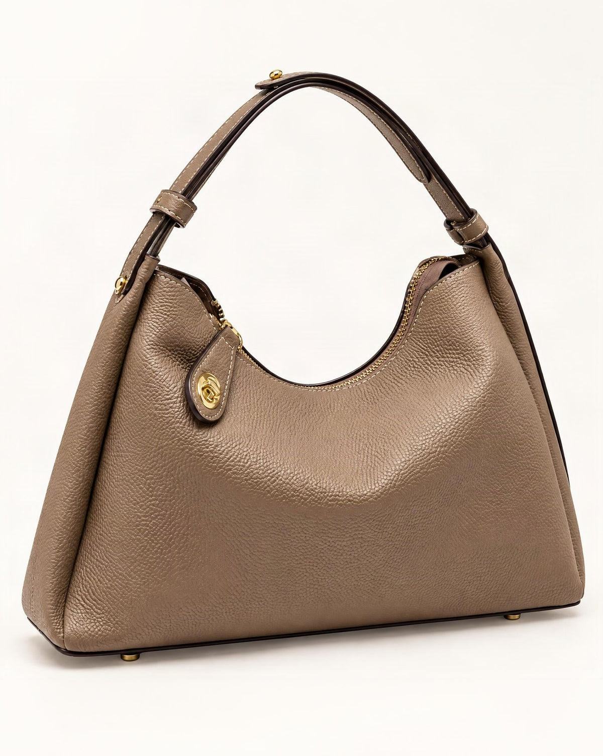 Cowhide Leather Small Plus Shoulder Bag — front three-quarter view on a warm white background