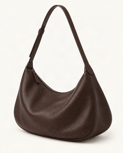 Top-Grain Cowhide Shoulder Hobo Bag — front three-quarter view on a warm white background
