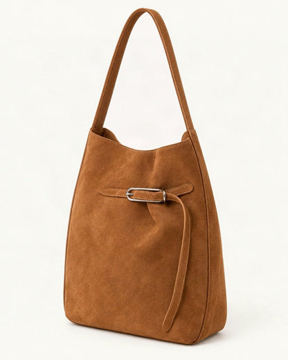 Suede Cowhide Shoulder Tote Bag — front three-quarter view on a warm white background