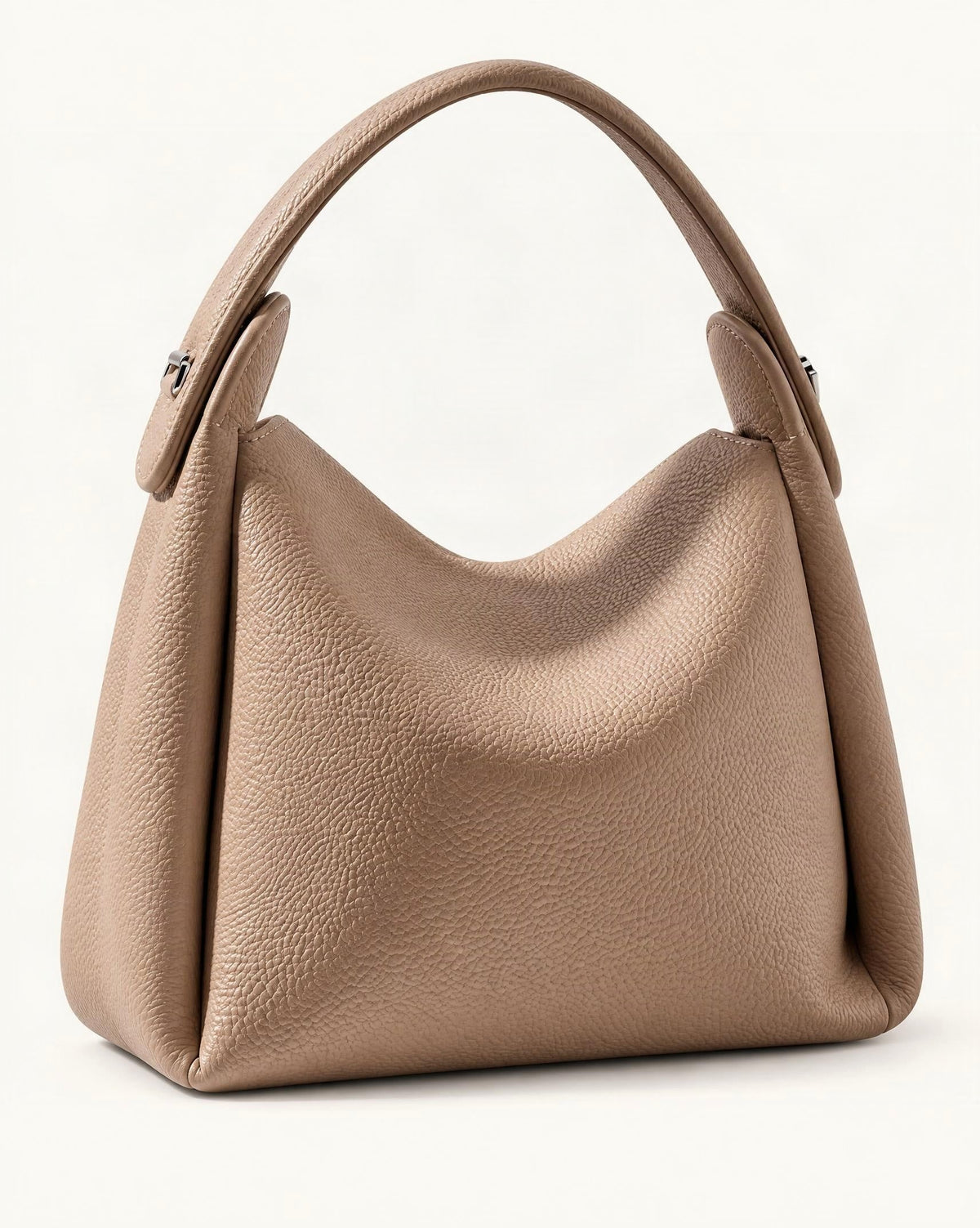 Pebbled Cowhide Leather Small Top-Handle Crossbody Bag — front three-quarter view on a warm white background