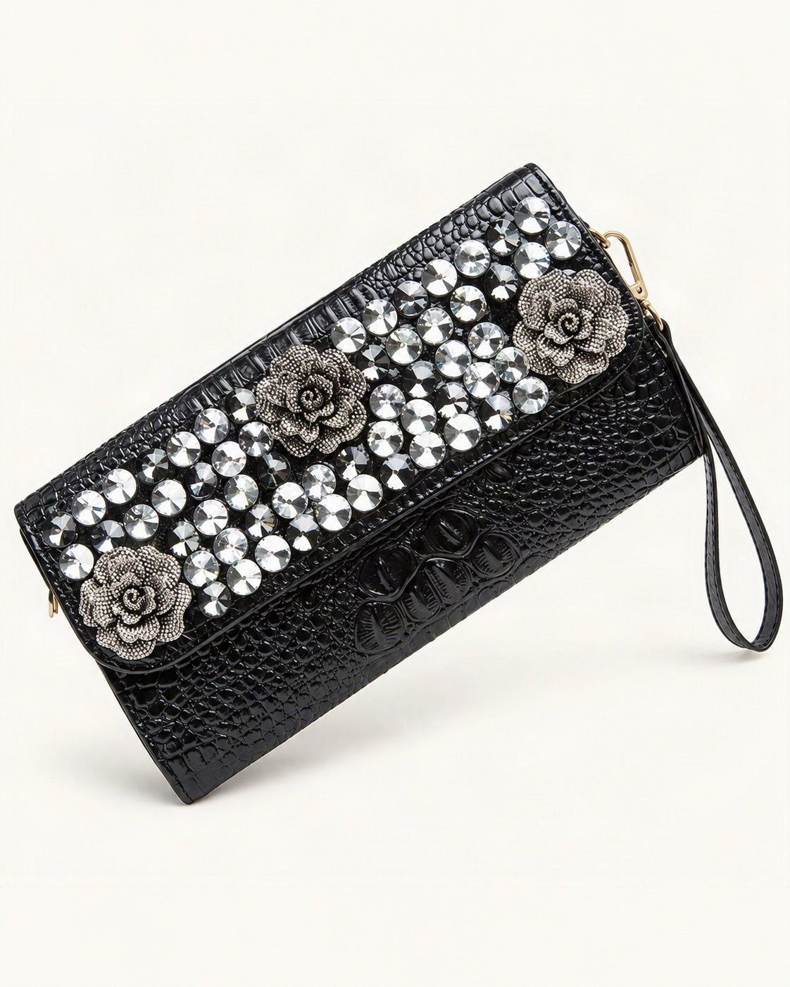 Split Leather Embellished Clutch — front three-quarter view on a warm white background