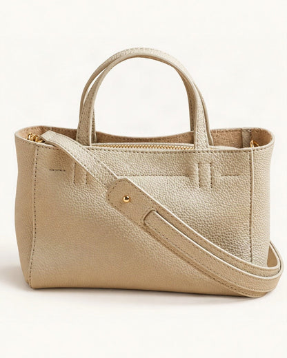 Top-Grain Cowhide Mini Tote Bag – Color Options — front three-quarter view on a warm white background