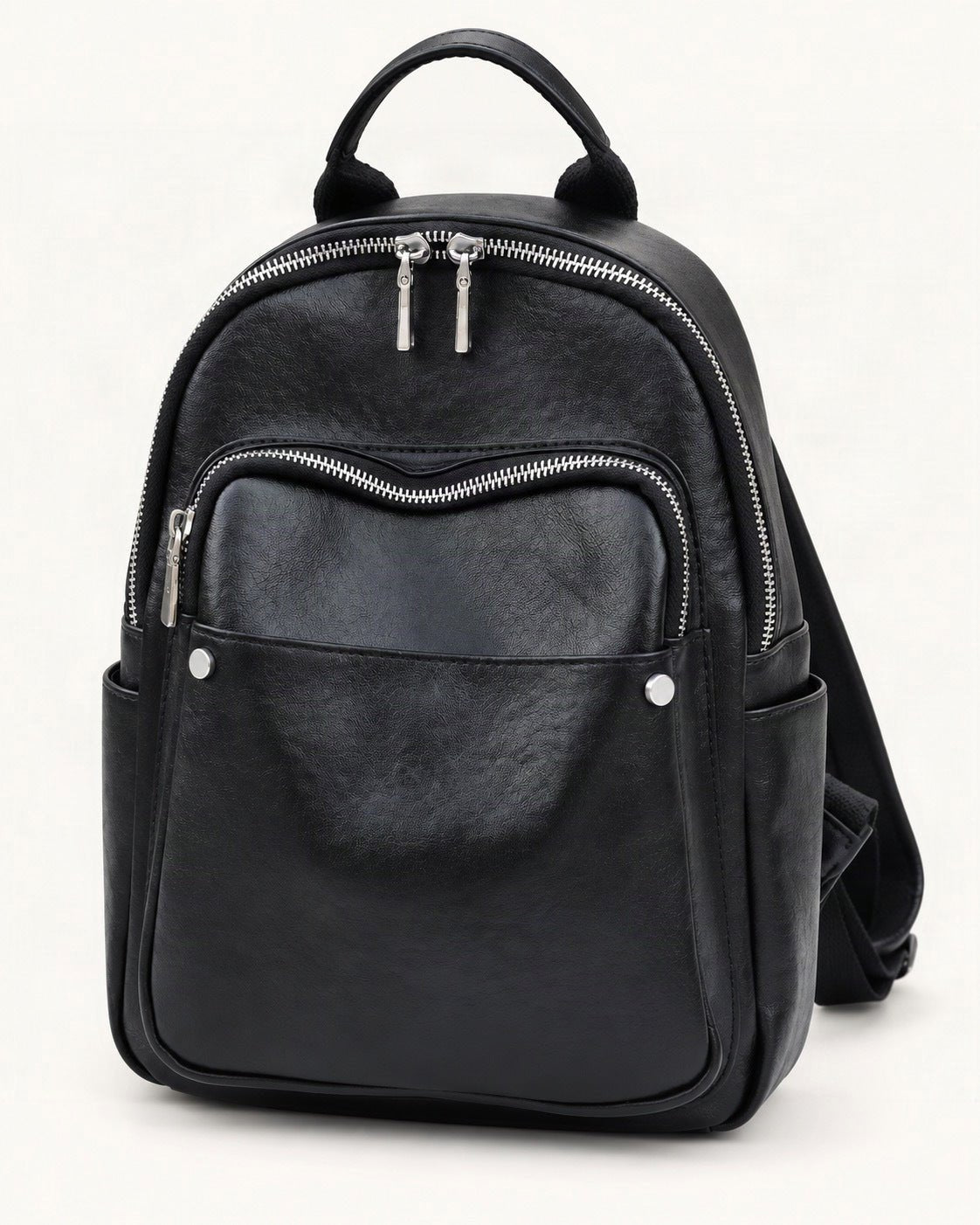 Top-Grain Cowhide Small Backpack — front three-quarter view on a warm white background