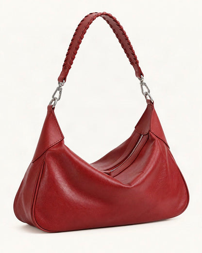 Top-Grain Cowhide Hobo Shoulder Bag — front three-quarter view on a warm white background