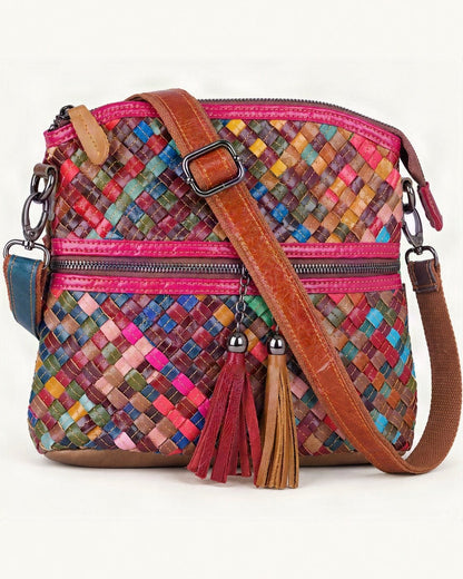 Cowhide Small Plus Crossbody Bag — front three-quarter view on a warm white background