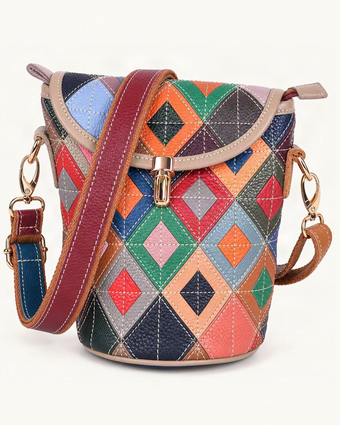 Top-Grain Cowhide Patchwork Bucket Crossbody Bag — front three-quarter view on a warm white background