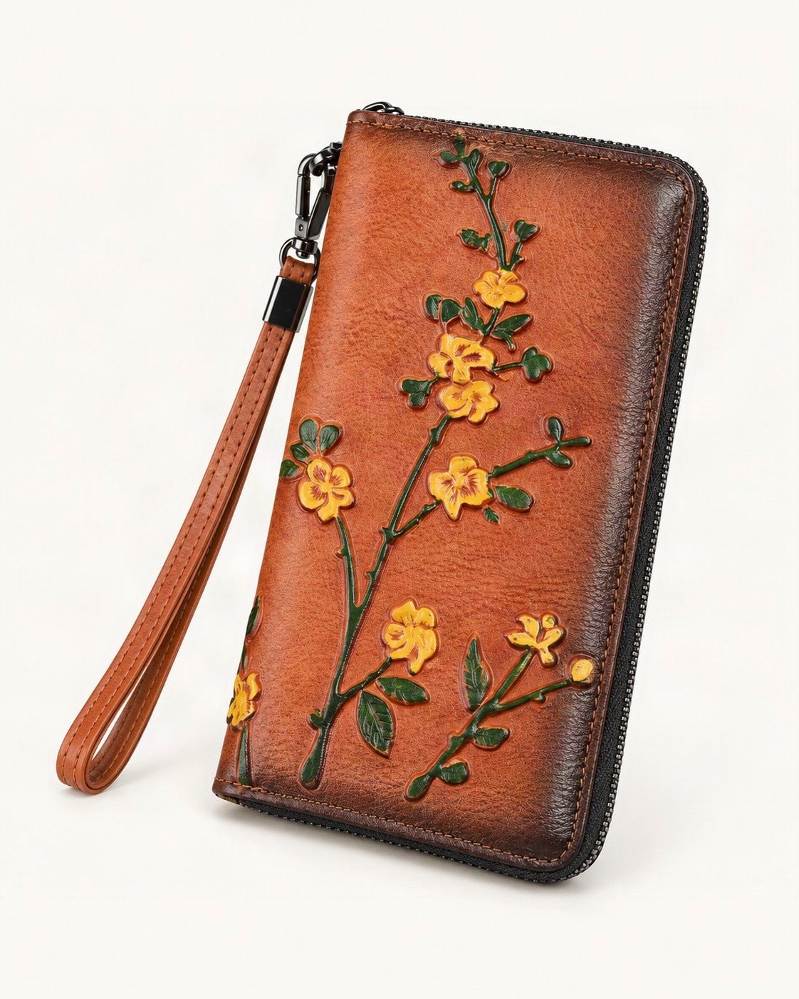Top-Grain Cowhide Wristlet Wallet — front three-quarter view on a warm white background