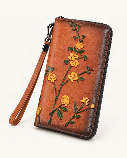 Top-Grain Cowhide Wristlet Wallet — front three-quarter view on a warm white background