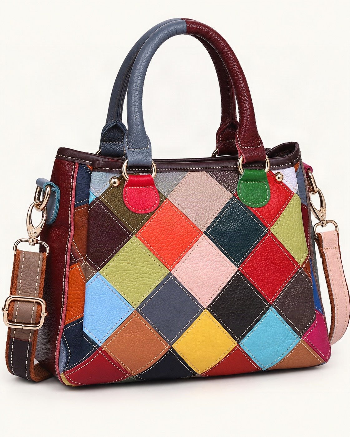 Top-Grain Cowhide Quilted Shoulder Bag — front three-quarter view on a warm white background