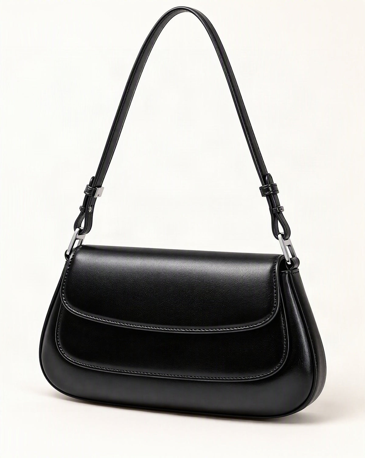 Genuine Cowhide Leather Baguette Shoulder Bag — front three-quarter view on a warm white background