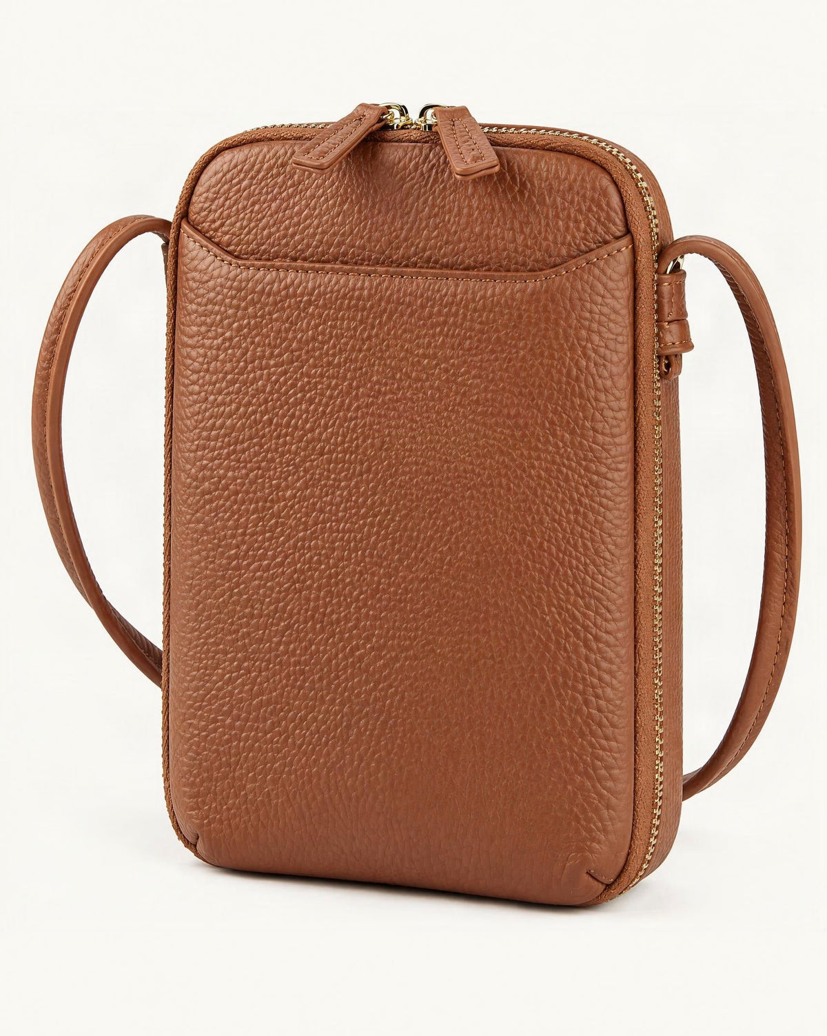 Cowhide Vertical Crossbody Phone Bag, Pebbled — front three-quarter view on a warm white background
