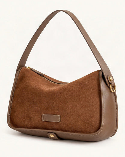 Suede Cowhide Small Crossbody Bag — front three-quarter view on a warm white background