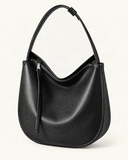Cowhide Leather Small Plus Hobo Shoulder Bag — front three-quarter view on a warm white background