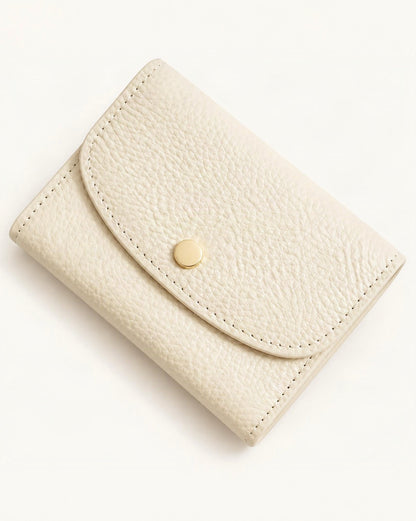 Cowhide Mini Coin Purse Wallet with RFID Card Slots — front three-quarter view on a warm white background