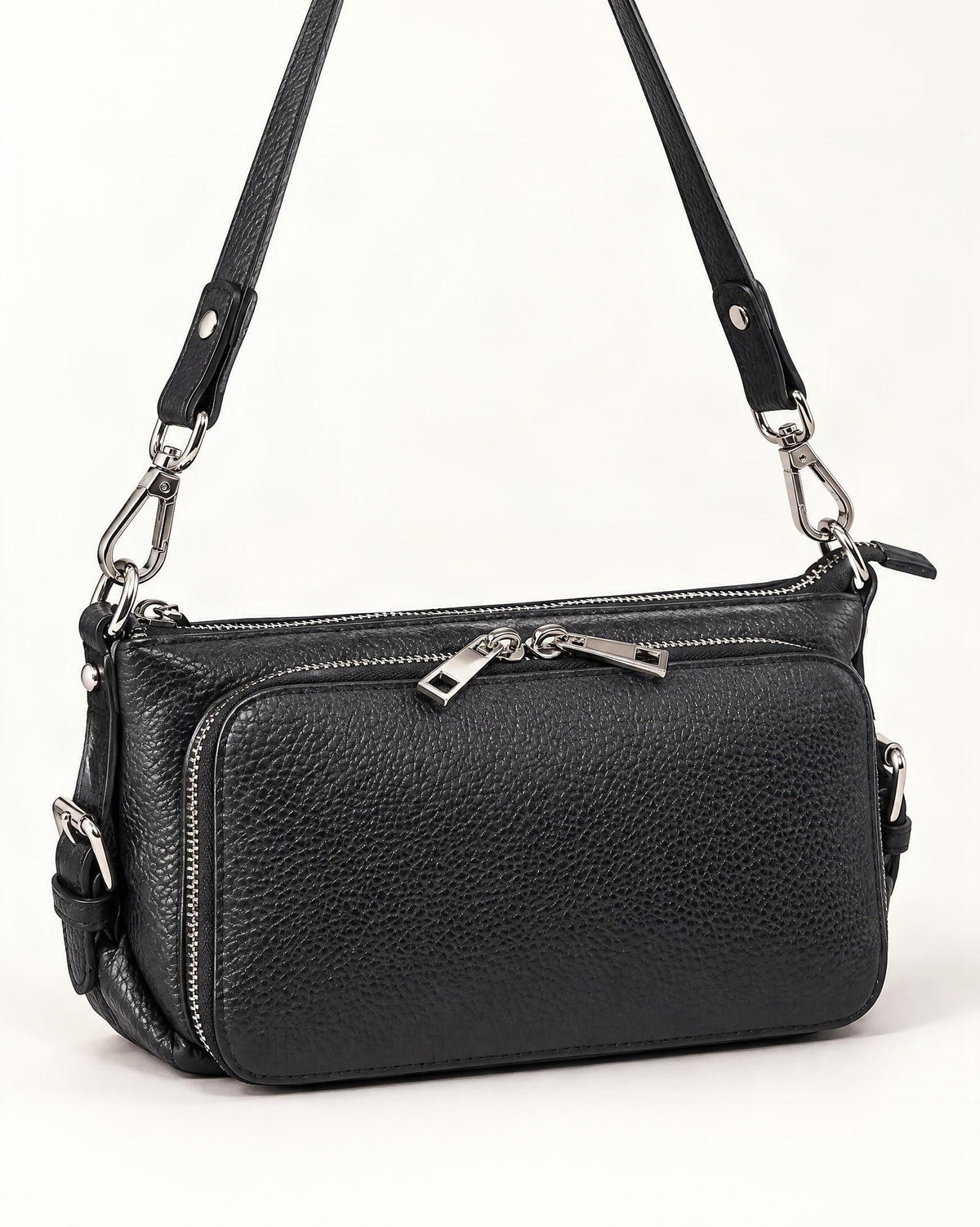 Top Grain Leather Crossbody Bag with 10 Card Slots — front three-quarter view on a warm white background