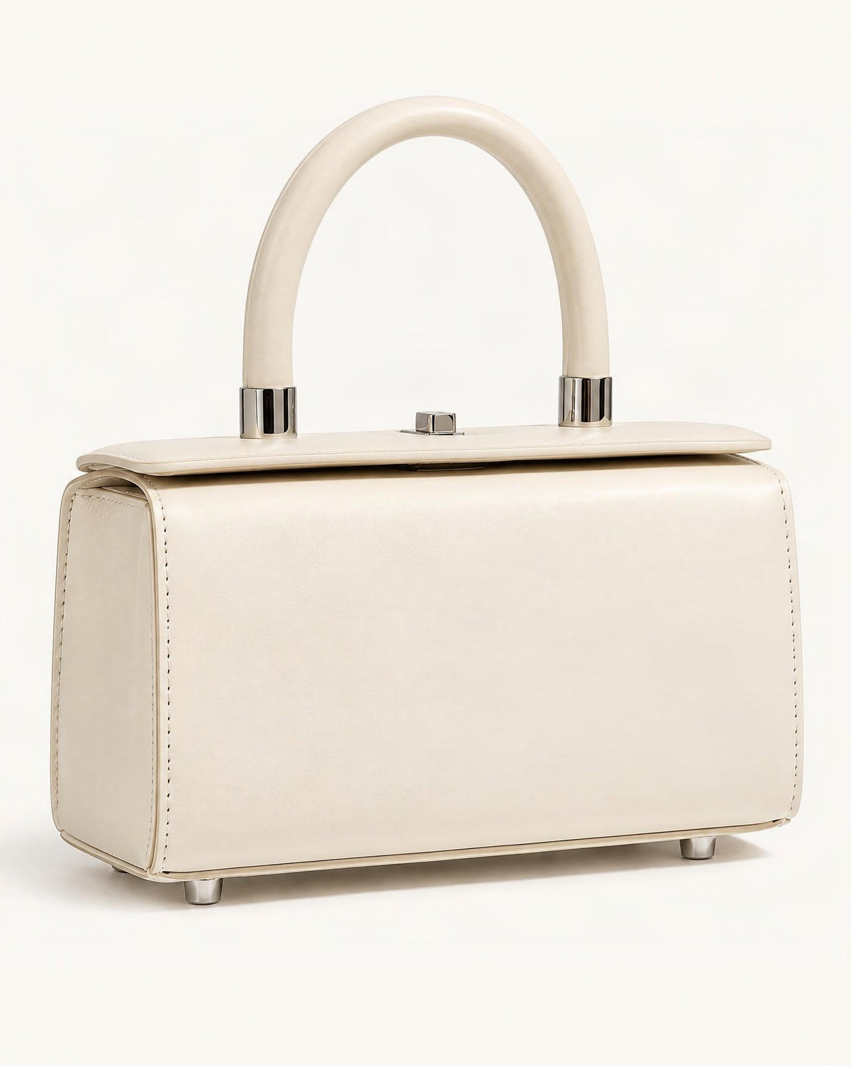Cowhide Leather Box Handbag — front three-quarter view on a warm white background